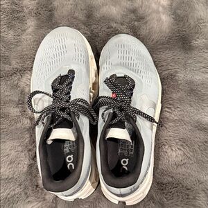 On Running Athletic Shoes in Light Green and Black